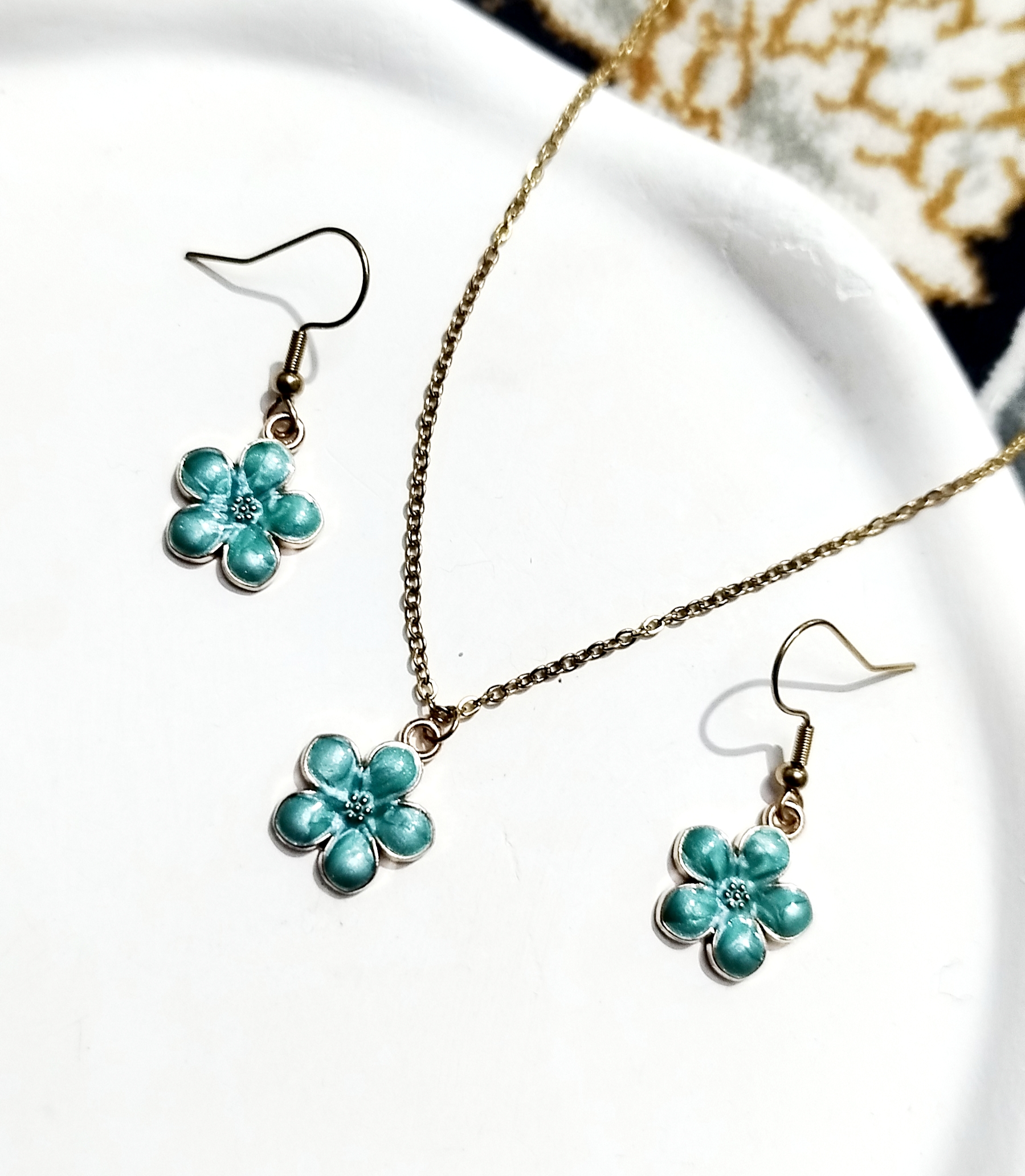 نیم ست گوشواره گردنبند گل آبی فیروزه ای ترند استیل ضد حساسیت از برند Zara accessories